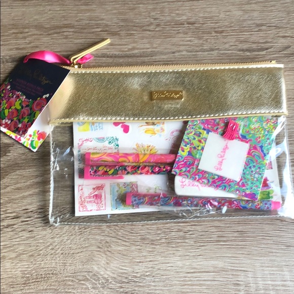 Lilly Pulitzer Handbags - Lilly Pulitzer case gold and clear with goodies!